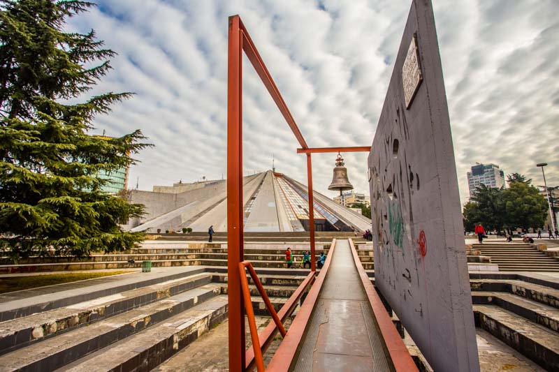 Albania, Tirana: Peace Bell, next to Pyramid. Monument in remembrance of victims of 1997 riots