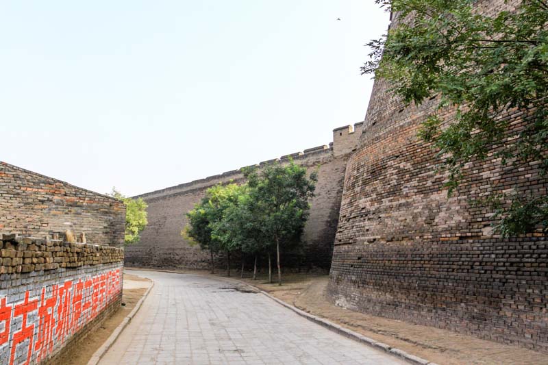 A Cultural Revolution slogan written on a wall in Pingyao old town (Shanxi Province, China)