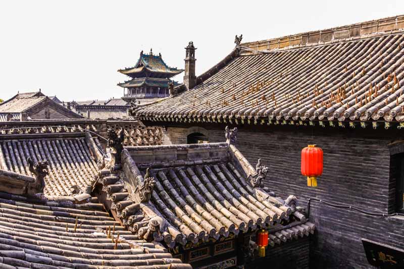Pingyao old city (Shanxi Province, China): The roofs of Pingyao and the City Tower seen from Tianjixiang