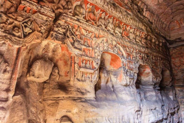Yungang Grottoes, Datong, China: Cave no. 2. Intricate carvings with colours