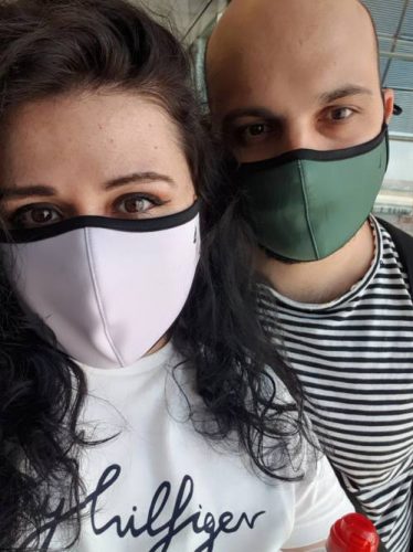 Couple with washable reusable masks