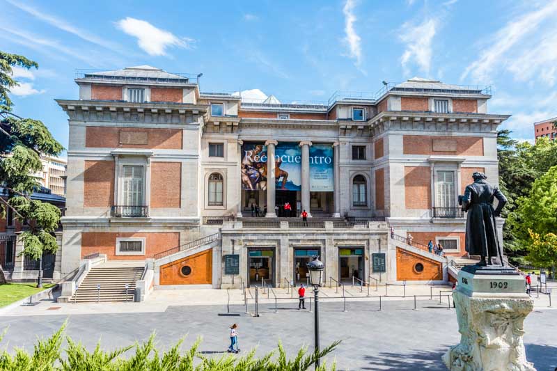 Museo del Prado, world famous painting museum in Madrid, Spain. 18th century Baroque building in brick and stone with columns and stairs