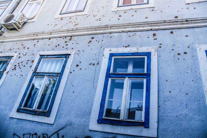 Apartment building with bullet damage in Mostar